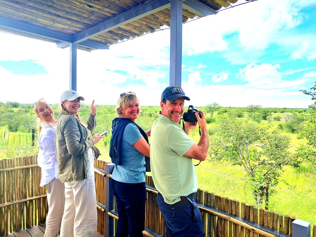 Guests on a game-viewing platform in Etosha